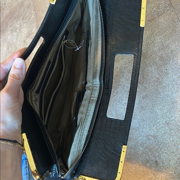 Elegant Black Clutch with Gold Accents - Picture 2 of 4